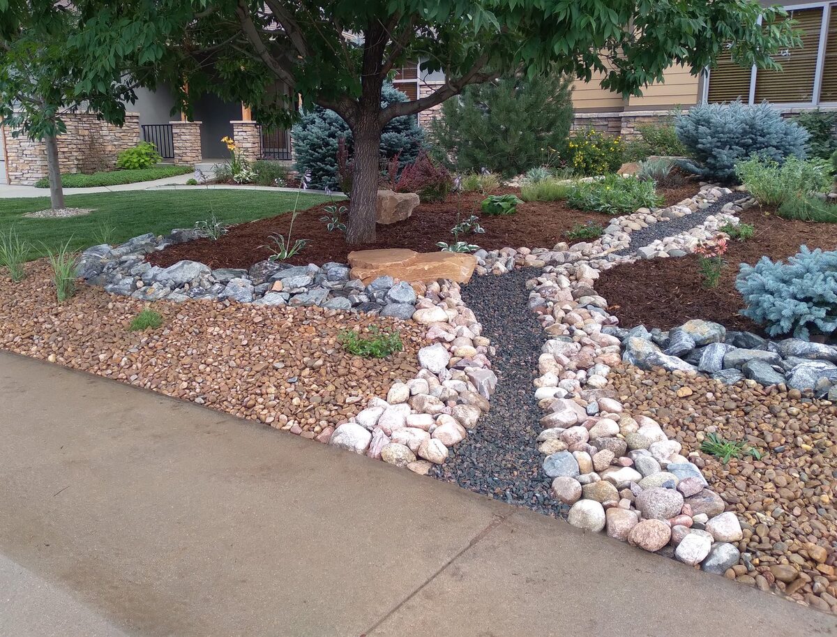 Front yard dry creek drainage swale by Brooks Landscape